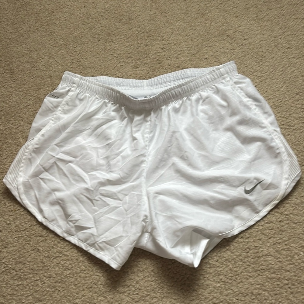 White Nike shorts